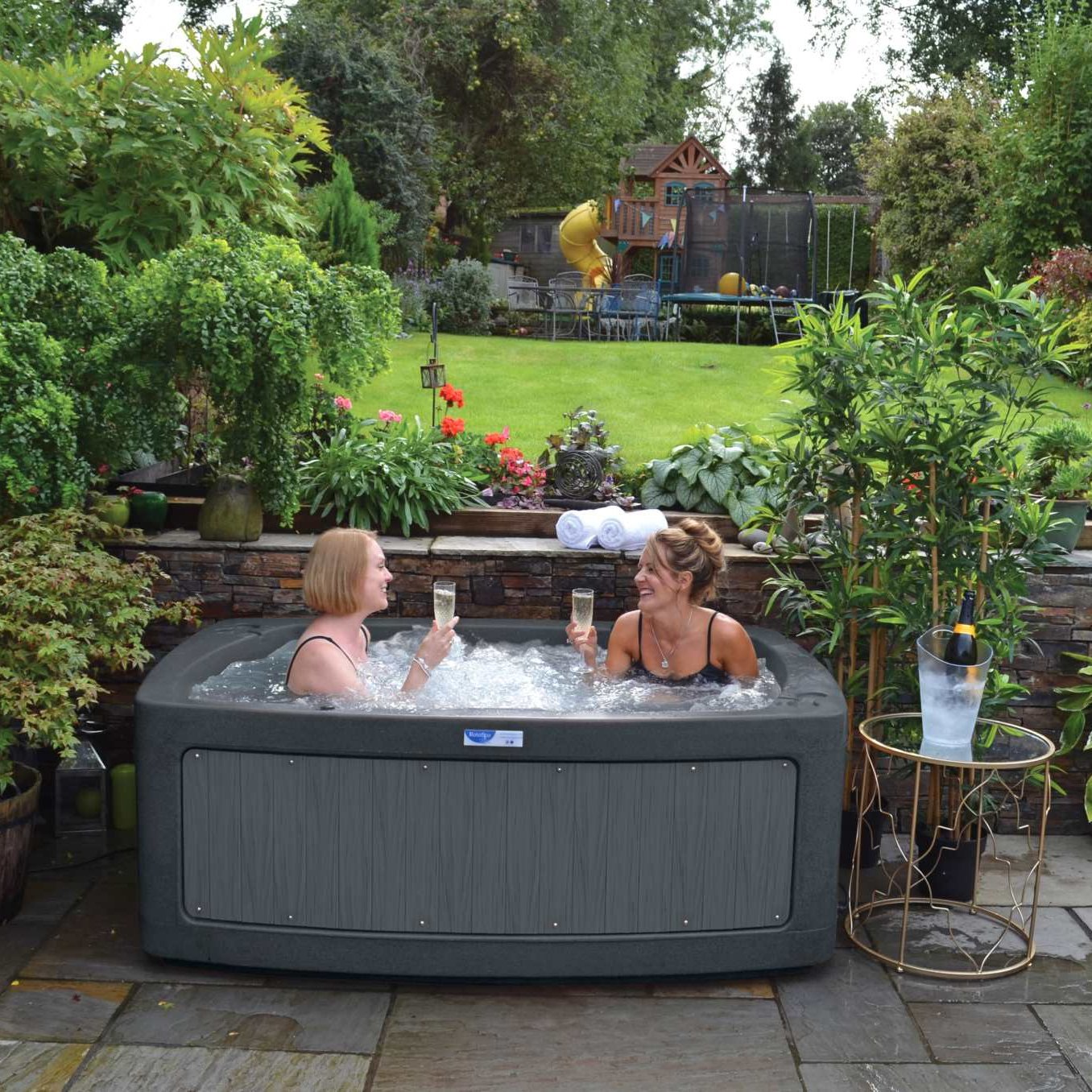 RotoSpa-Duo-S080-2-3-Persons-Outdoor-hot-tub-dark-gray-in-the-garden